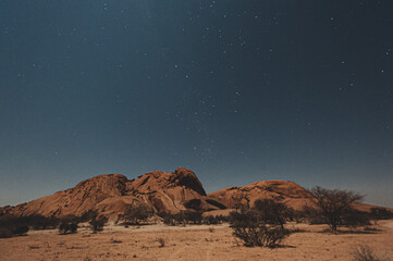 Fototapeta na wymiar Night shot of the Namibian Desert near Spitzkoppe, under a clear starry southern sky.