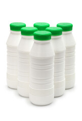 white plastic bottles with yogurt stand on table