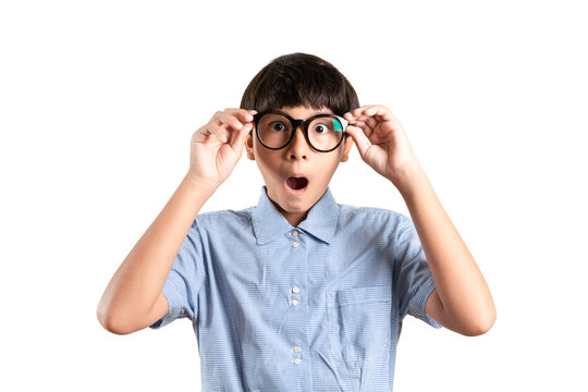 Smart boy in big glasses is open mouth and eyes unbelievably surprised excited and shocked by new glasses, Education inspired. Gadgets poor vision and Emotions concept ideas. Isolate over white