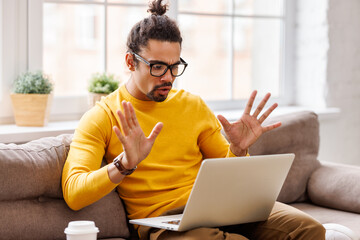 Black male freelancer making video call
