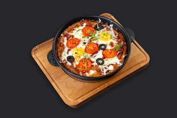 Low-carb keto diet Pizza with mozzarella and tomato crust with cheese filling. Low carb keto diet cake made from almond flour and mozzarella instead of classic pizza.