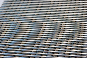 shiny metal corrugation. bent aluminum foil lamella.