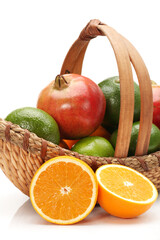 fruits  in basket on white.
