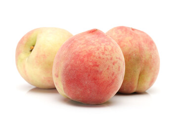 three peach isolated on white