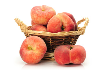 chinese flat peaches on white background 