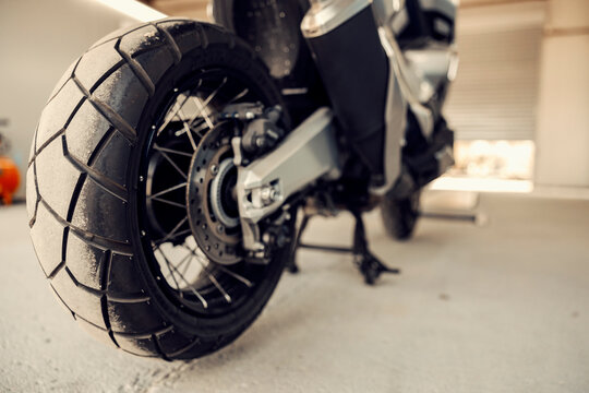 Close up of a motorbike tire on a technical inspection.