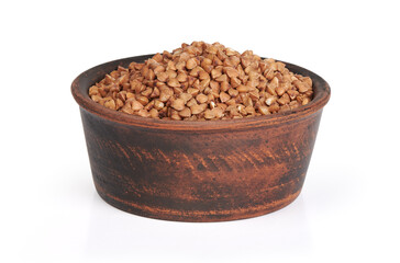 Buckwheat seeds in a bowl isolated on white background