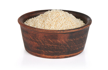 Sesame seeds in a bowl isolated on white background