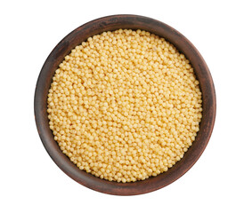 Dry millet in clay bowl isolated on white. Top view