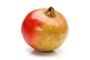 Ripe pomegranate fruit isolated on white background