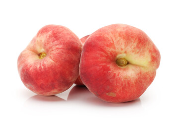 chinese flat peaches on white background