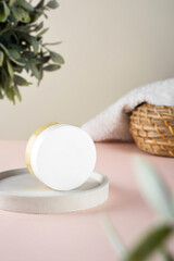 An open jar with Lanolin, a grease from sheep wool. Acts as a skin ointment, water-proofing wax,...