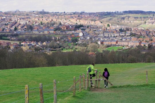 Climbing over the stile towards Elsecar, in Barnsley, England.