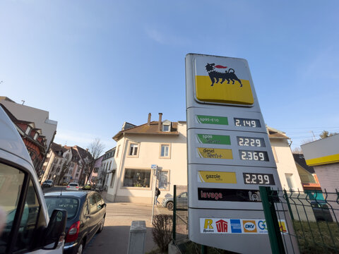 Strasbourg, France - Mar 11 2022: View From Below Of Italian Eni Gas Station With New Prices At The Pump Exceeding All Expectations. The War In Ukraine Has Pushed Fuel Prices Above The Two-euro 