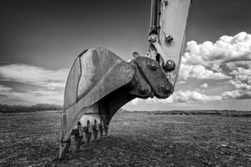 Industrial background. Digger bucket close-up. Construction excavator bucket. - obrazy, fototapety, plakaty