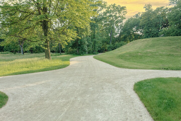 Fototapeta na wymiar Beautiful and neat path in the city park, landscape