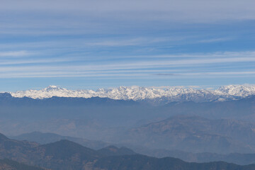 Fototapeta na wymiar Himachal himalayan range telephoto capture. Indrasan peak in district kullu on left. Picture taken from Naina devi temple rewalsar