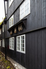 Narrow street with typical houses in Thorshavn on the Streymoy Island. Faroe Islands.
