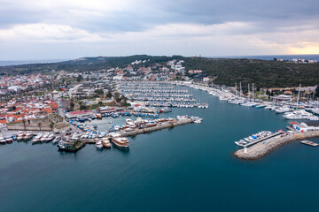 Fototapeta na wymiar Sigacik harbour and castle view. Sigacik is populer tourist attraction in Turkey.