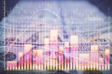 Double exposure of forex graph drawing over us dollars bill background. Concept of financial markets.