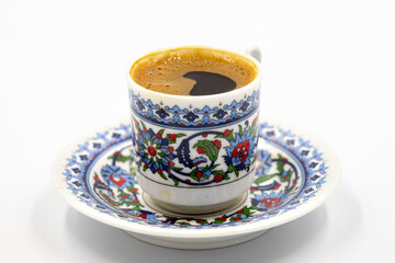 Turkish coffee isolated on white background. Traditional Turkish cuisine flavor. close up