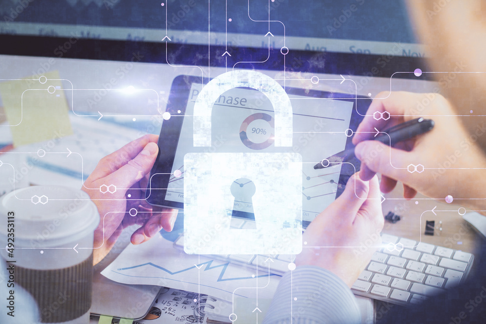 Poster Multi exposure of man's hands holding and using a digital device and lock drawing. Security concept.