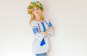 Ukrainian fashionable woman in embroidery traditional shirt. Concept of brave Ukraine and people of that country 