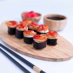 shrimp nigiri and sauce sushi on white background. Close Up of delicious japanese food with sushi roll.