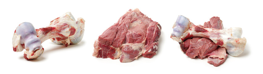 Raw beef bones and raw beef on white background