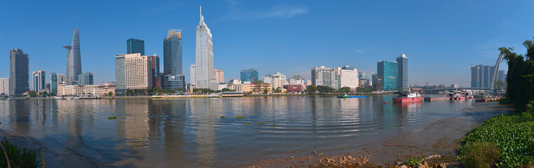 Fototapeta na wymiar Landscape photo: View of buildings located on the Saigon River. Time: March 13, 2022. Location: Ho Chi Minh city