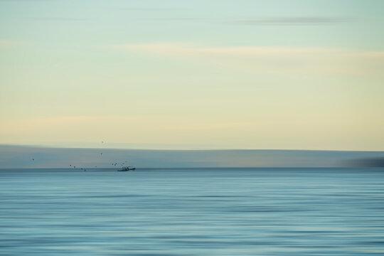 Seascape of a ship in motion offshore 
