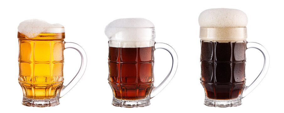  Three mugs of different beers. Dark beer, red beer, light beer. Isolated on white background.