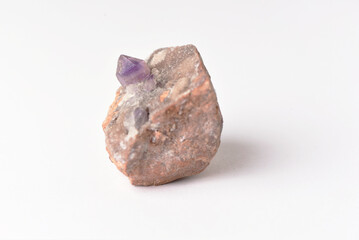 amethyst crystal grown on another stone ,marble, granite,