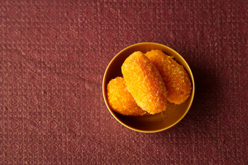 Diwali sweets Mango chum chum barfi petha Laddu peda Indian sweet festival dish mithai Dussehra...