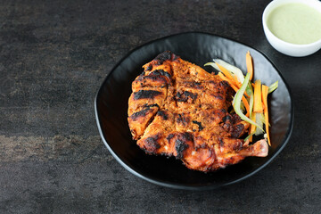 Arabian grilled chicken also called Al Faham or Alfaham or Djaj very popular recipe in Middle East. made using mix Bezar spices and barbeque in a charcoal grill or in oven.
