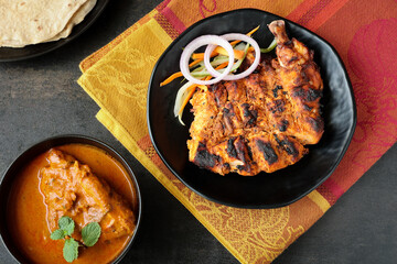Arabian grilled chicken also called Al Faham or Alfaham or Djaj very popular recipe in Middle East. made using mix Bezar spices and barbeque in a charcoal grill or in oven.