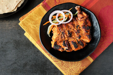 Arabian grilled chicken also called Al Faham or Alfaham or Djaj very popular recipe in Middle East. made using mix Bezar spices and barbeque in a charcoal grill or in oven.