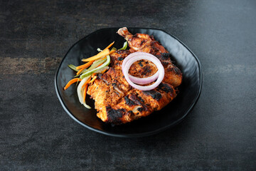 Arabian grilled chicken also called Al Faham or Alfaham or Djaj very popular recipe in Middle East. made using mix Bezar spices and barbeque in a charcoal grill or in oven.