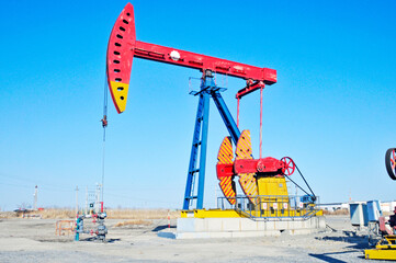 Fototapeta premium Oil pumps on industrial land