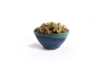 Freeze Dried Pork Breakfast Sausage Pieces in Blue Pottery Bowl
