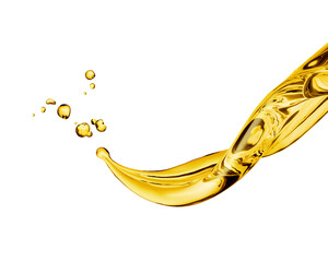 From a flying gush of golden yellow oil, individual drops of oil are thrown into the air against a white background.