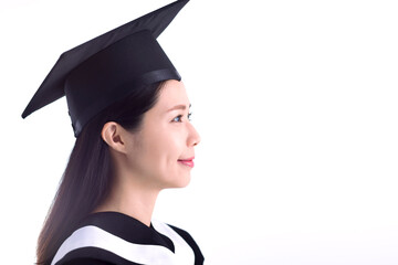 Side view of  Young Asian Woman Students wearing Graduation hat and gown