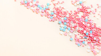 Abstract Green background with many small candies.