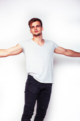 young handsome teenage hipster guy posing emotional, happy smiling against white background isolated, lifestyle people concept