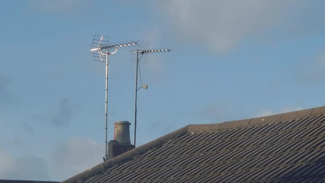 Heavy Storm Wind Shakes Tv Aerial On Roof In England Uk