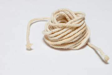 a ball of rope on a white background