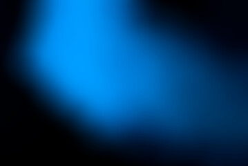 Blue blurred smoke on a black background.