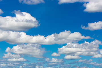 beautiful blue sky and white fluffy cloud horizon outdoor for background.
