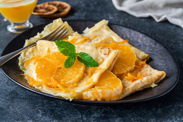 Crepes Suzette - French pancakes with orange liqueur sauce