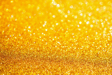 gold glitter sparkle with bokeh background